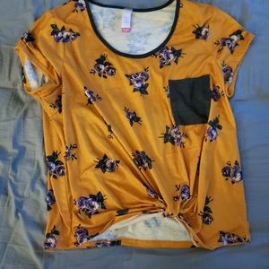 Yellow pocket shirt with flowers